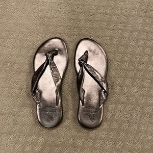 Saks Fifth Avenue bronze sandals.